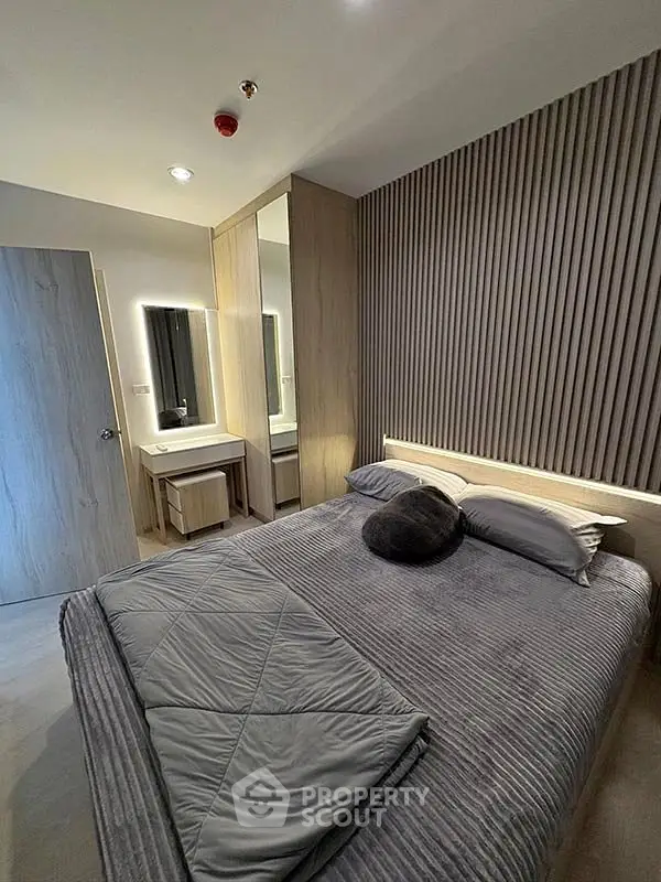 Modern bedroom with stylish decor and cozy ambiance