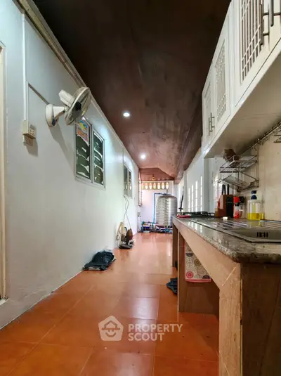 Spacious kitchen with open layout and modern appliances, perfect for culinary enthusiasts.