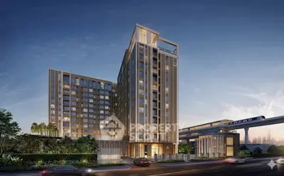 Modern high-rise building with sleek design and lush landscaping, ideal for urban living.