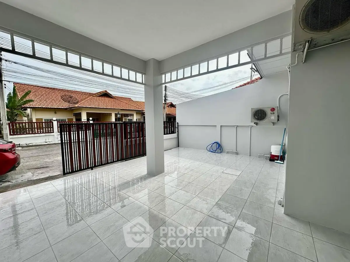 Spacious tiled carport with modern design in suburban home