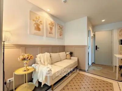 Charming living room with cozy sofa and elegant decor in modern apartment.