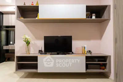 Modern living room with sleek TV unit and stylish decor