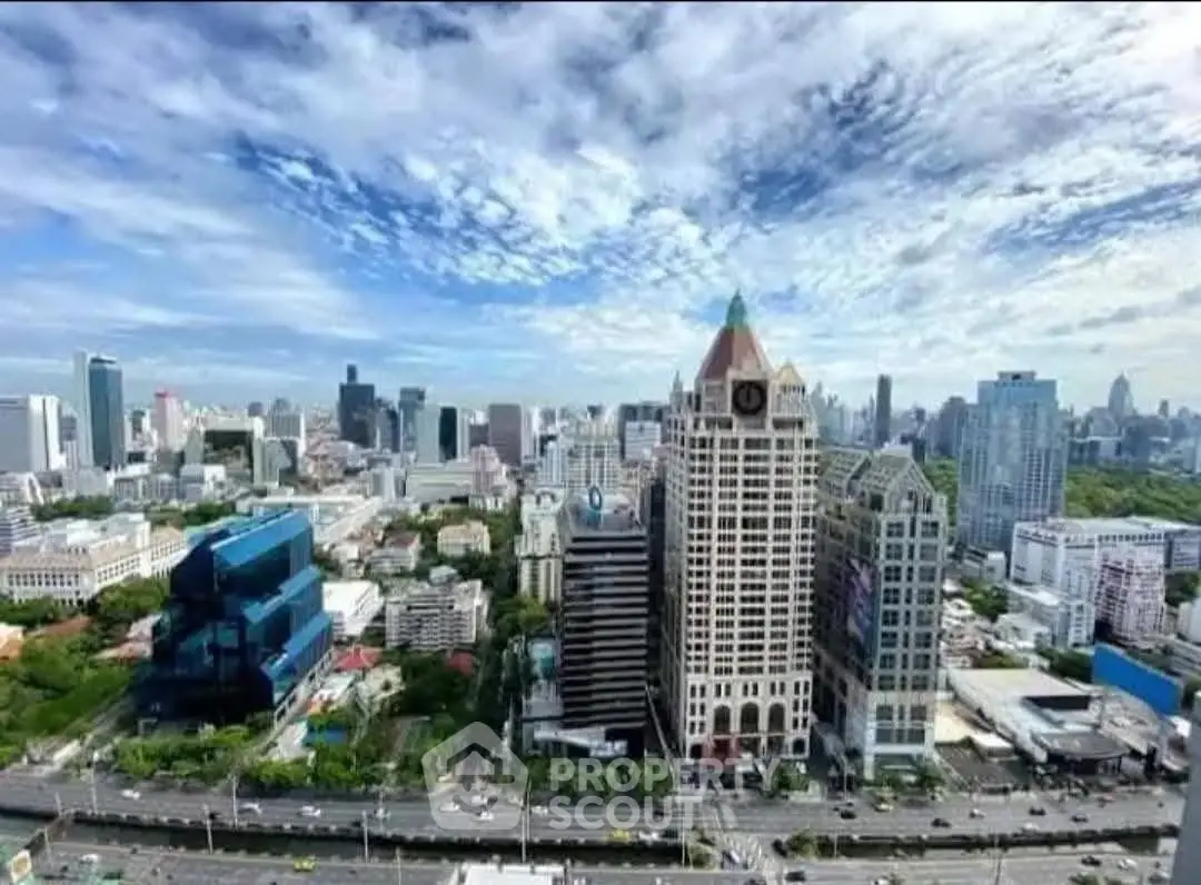 Stunning cityscape view showcasing modern skyscrapers under a vibrant sky.