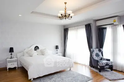 Elegant bedroom with stylish decor and natural light