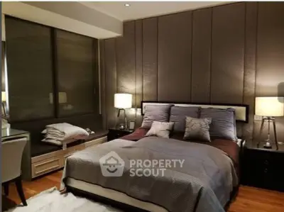 Luxurious bedroom with elegant decor and ambient lighting
