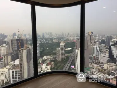 Stunning panoramic city view from high-rise apartment window