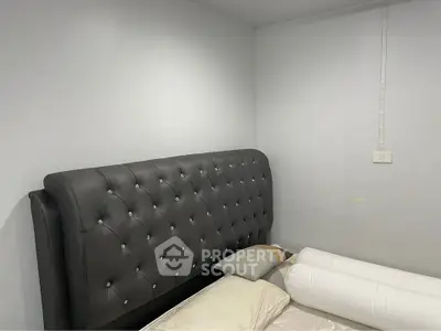 Modern bedroom with elegant tufted headboard and minimalist design