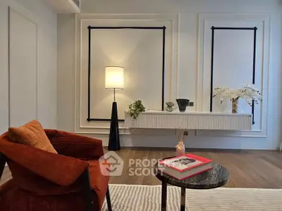 Stylish modern living room with elegant decor and cozy seating area.