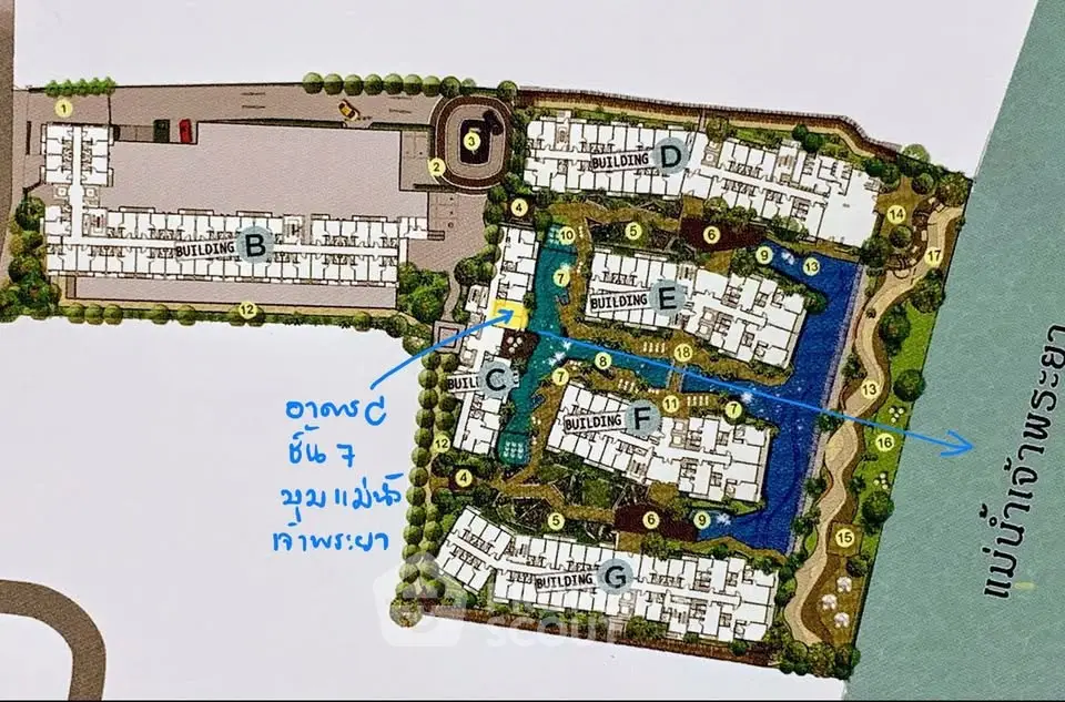 Detailed real estate site plan showcasing multiple buildings and lush landscaping near a river.