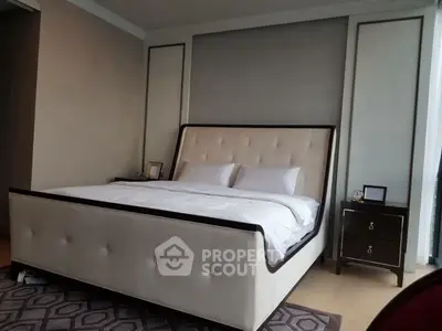Luxurious bedroom with elegant decor and plush bed in modern apartment