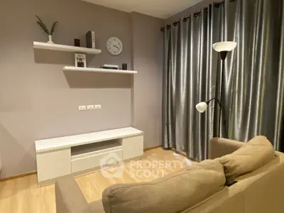 Cozy living room with modern decor and elegant curtains