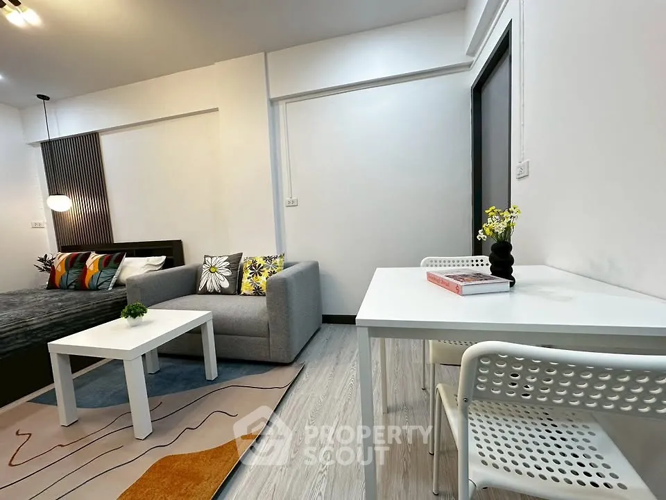 Modern living room with stylish decor and cozy seating area