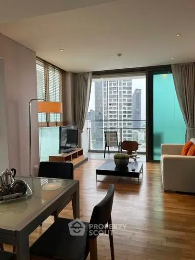 Modern living room with city view and stylish furniture in high-rise apartment