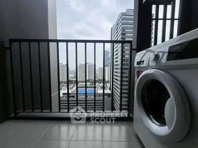 Urban balcony with washing machine and city view, perfect for modern living.