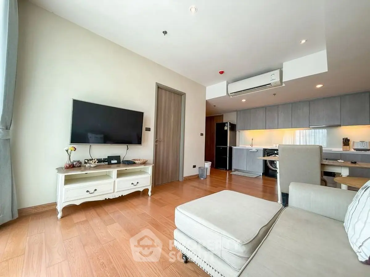 Spacious modern living room with open kitchen and stylish decor