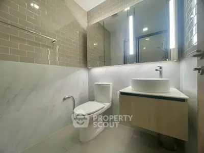 Modern bathroom with sleek fixtures and elegant tile design
