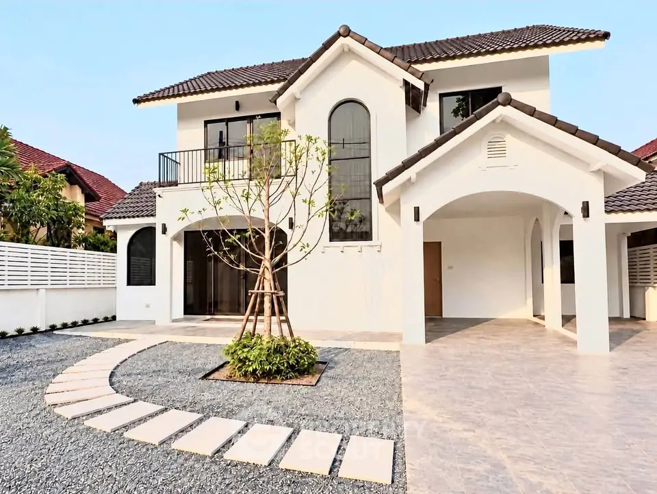 Elegant two-story house with modern architecture and spacious driveway