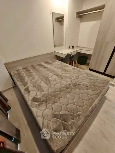 Modern bedroom with stylish furniture and cozy ambiance, perfect for relaxation and comfort.