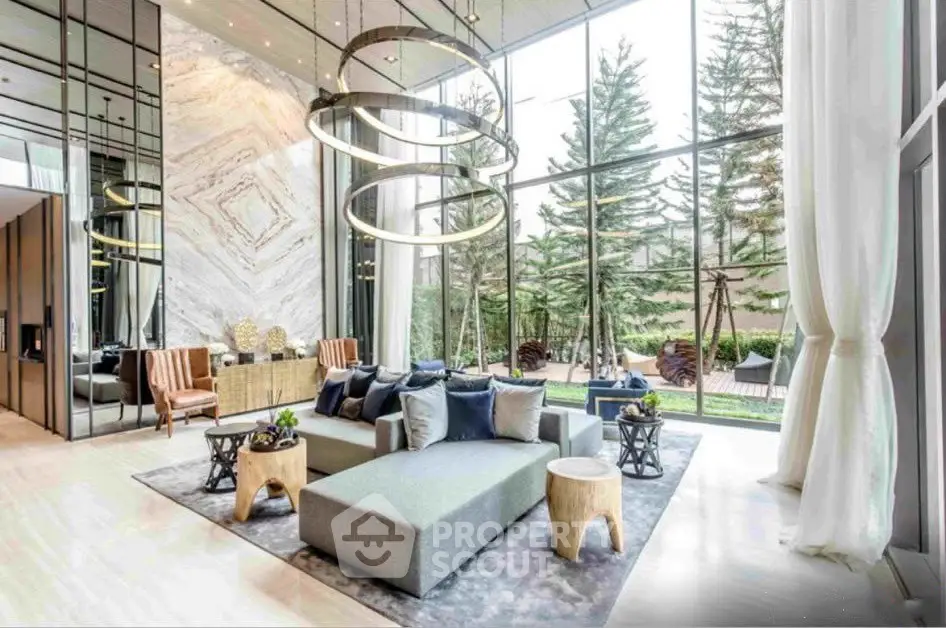 Luxurious modern living room with high ceilings and large windows overlooking a lush garden.