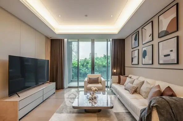 Luxurious modern living room with large TV and stylish decor