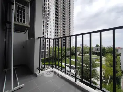 Modern balcony with city view in high-rise apartment building