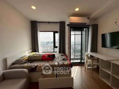 Modern bedroom with city view, featuring a cozy bed, wall-mounted TV, and stylish decor.