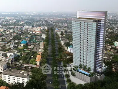 Stunning aerial view of modern high-rise building with panoramic cityscape backdrop.