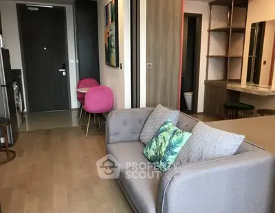 Modern living room with stylish decor and cozy seating area