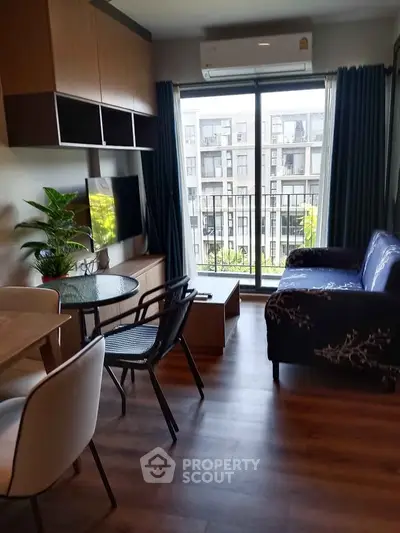 Modern living room with balcony view in stylish apartment