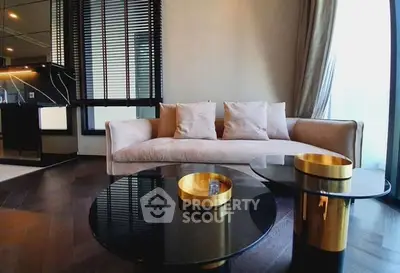 Luxurious living room with elegant sofa and stylish coffee tables