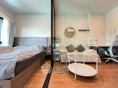 Modern studio apartment with stylish decor and cozy furnishings