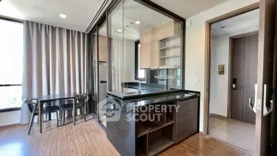 Modern kitchen with sleek design and open layout in a stylish apartment