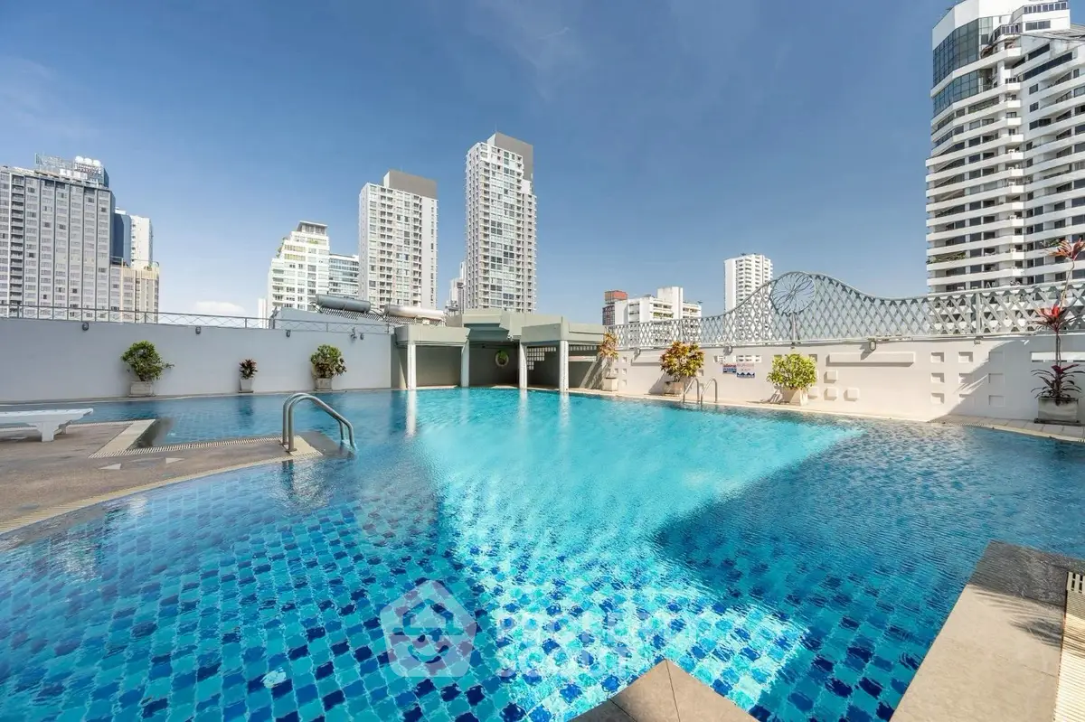 Stunning rooftop pool with city skyline views in modern urban setting
