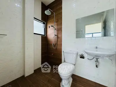 Modern bathroom with sleek shower and elegant fixtures