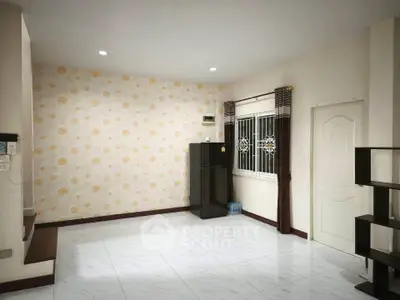 Spacious unfurnished living room with tiled floor and floral wallpaper