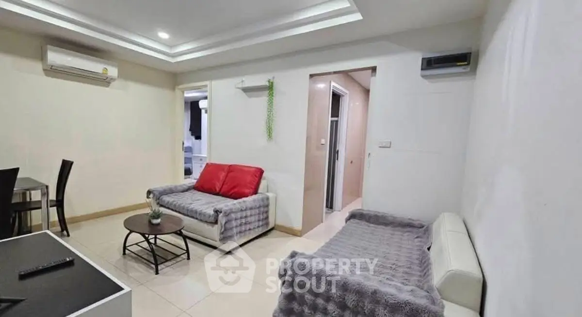 Modern living room with cozy seating and stylish decor