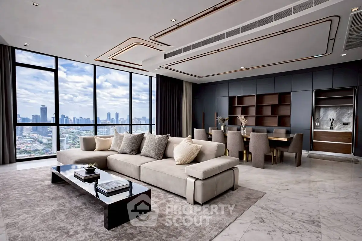 Luxurious modern living room with panoramic city views and elegant furnishings.