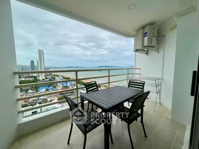 Stunning balcony with ocean view and modern outdoor dining set