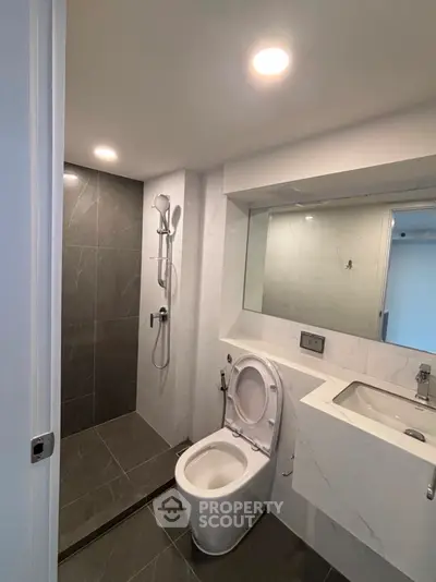 Modern bathroom with sleek design and spacious shower area