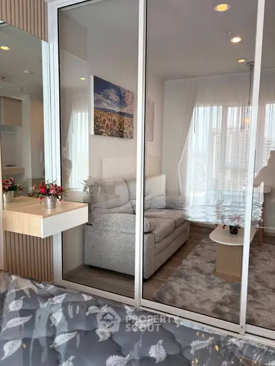 Modern living room with cozy sofa and stylish decor in a high-rise apartment