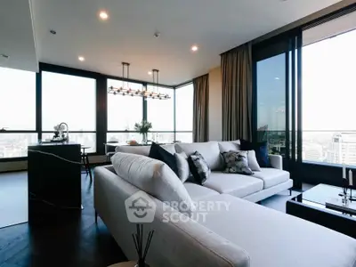 Luxurious modern living room with panoramic city views and elegant furnishings.