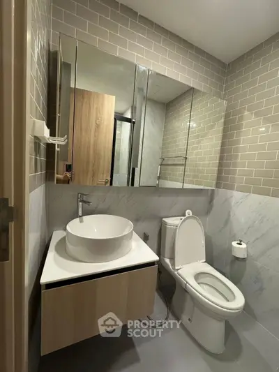 Modern bathroom with sleek fixtures and stylish tile design