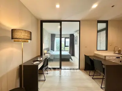 Modern studio apartment with open layout and stylish furnishings