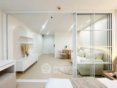 Modern open-plan living room with stylish decor and cozy ambiance