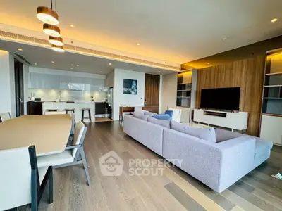 Spacious modern living room with open kitchen and elegant decor