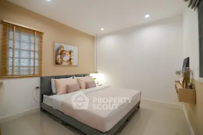 Modern bedroom with stylish decor and cozy ambiance