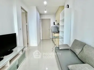 Modern living room with sleek furniture and minimalist design, perfect for urban living.