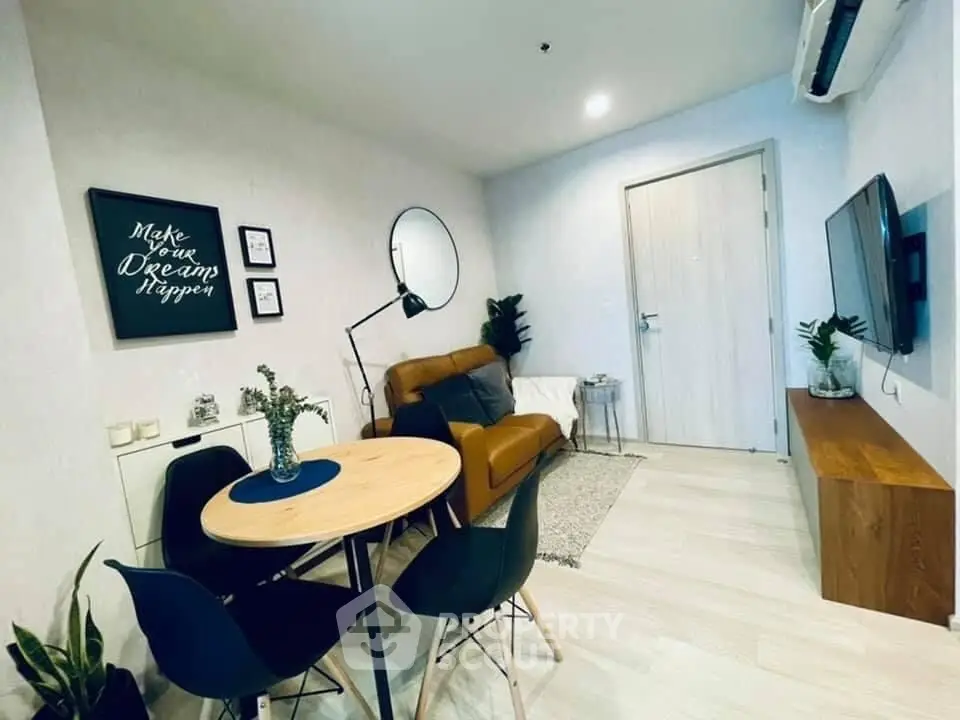 Modern living room with stylish decor and cozy seating area, perfect for relaxation and entertainment.