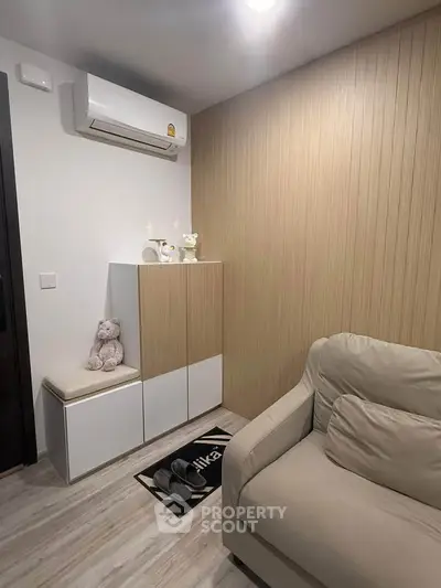 Cozy living room with modern decor and air conditioning