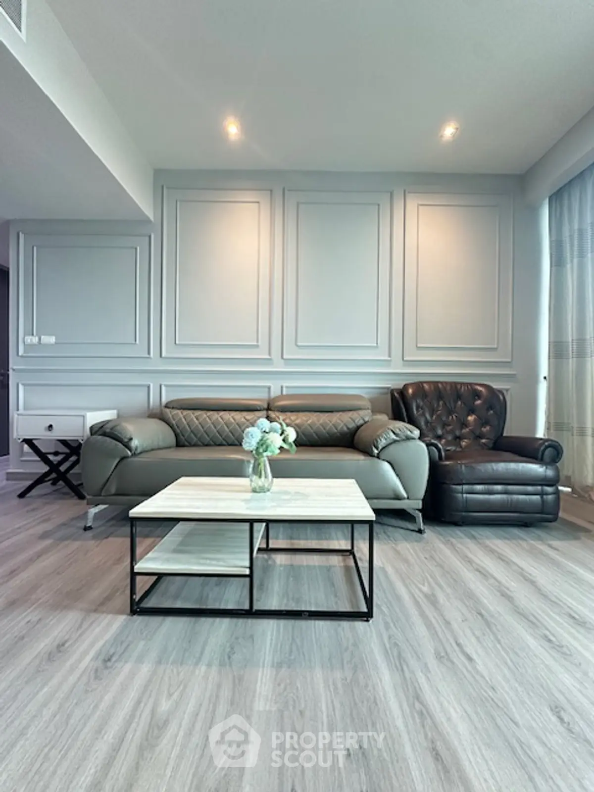 Modern living room with stylish furniture and elegant decor